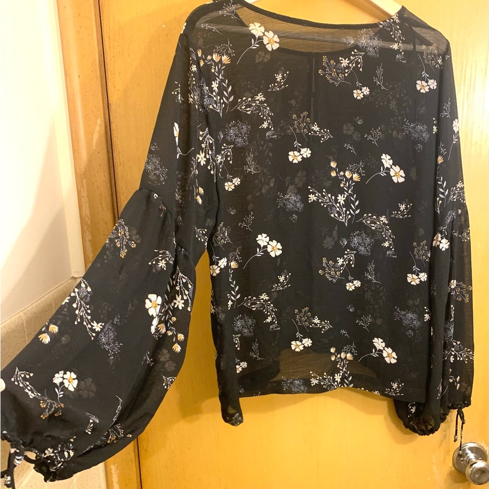 Sheer black floral blouse